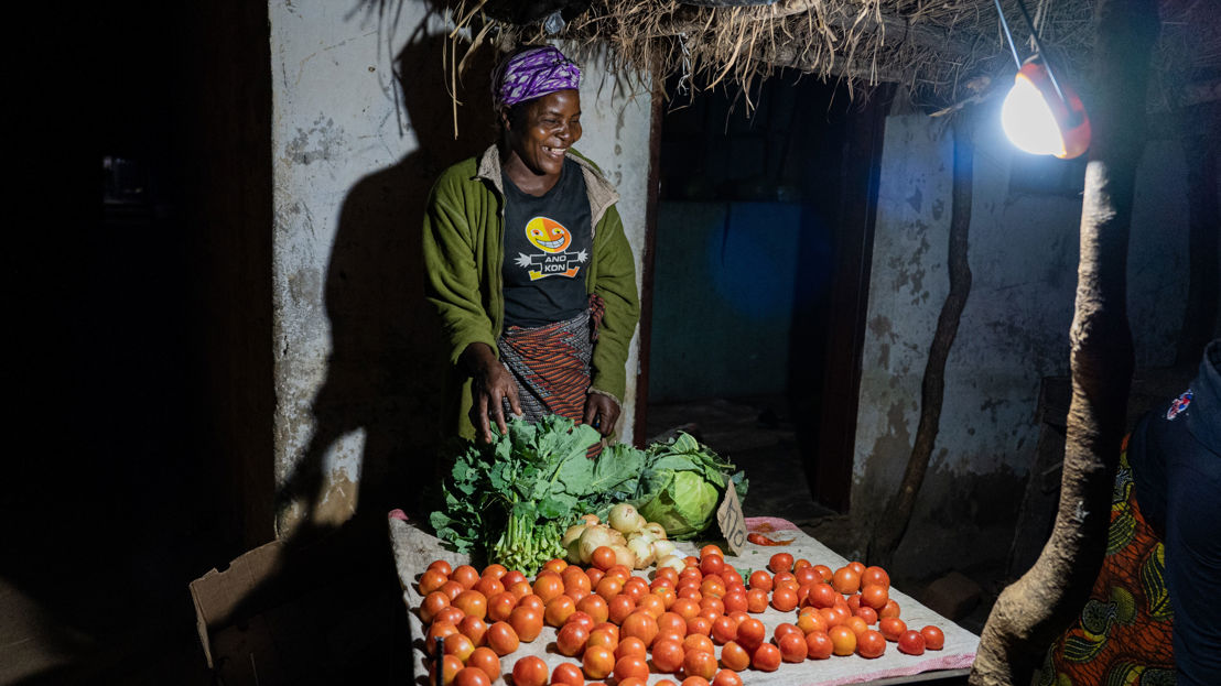A Trader Uses Her Light To Sell Her Produce At The Local Market. Photo Credit Solaraid Jason J Mulikita